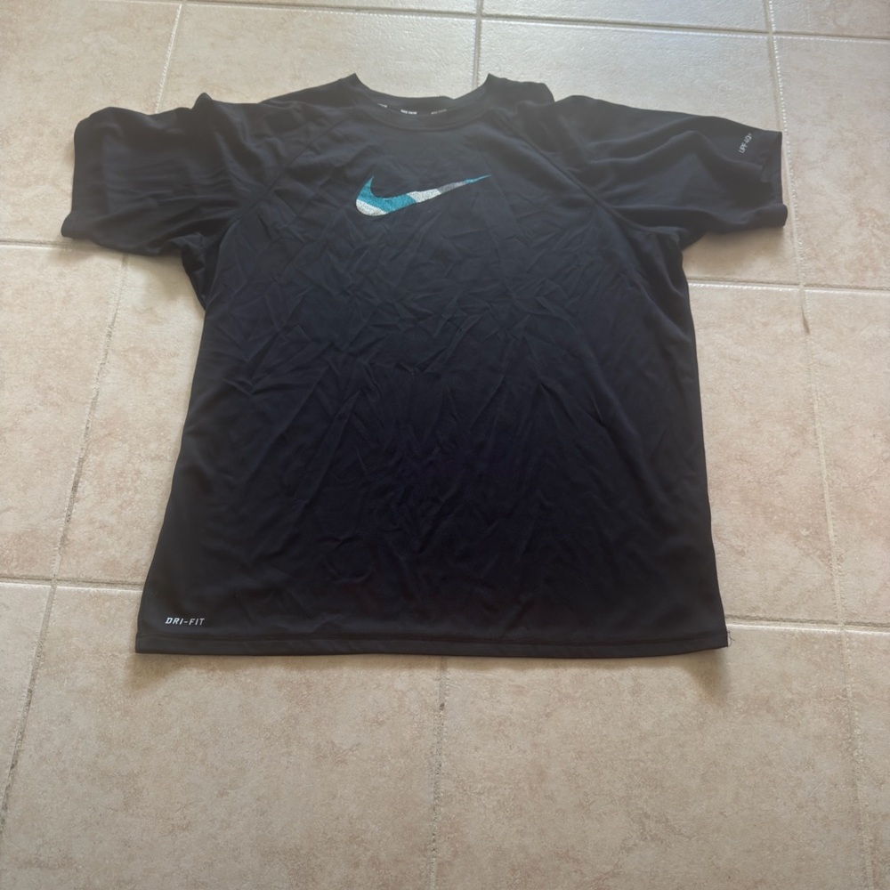 Nike Men's Black Tee with Blue Swoosh